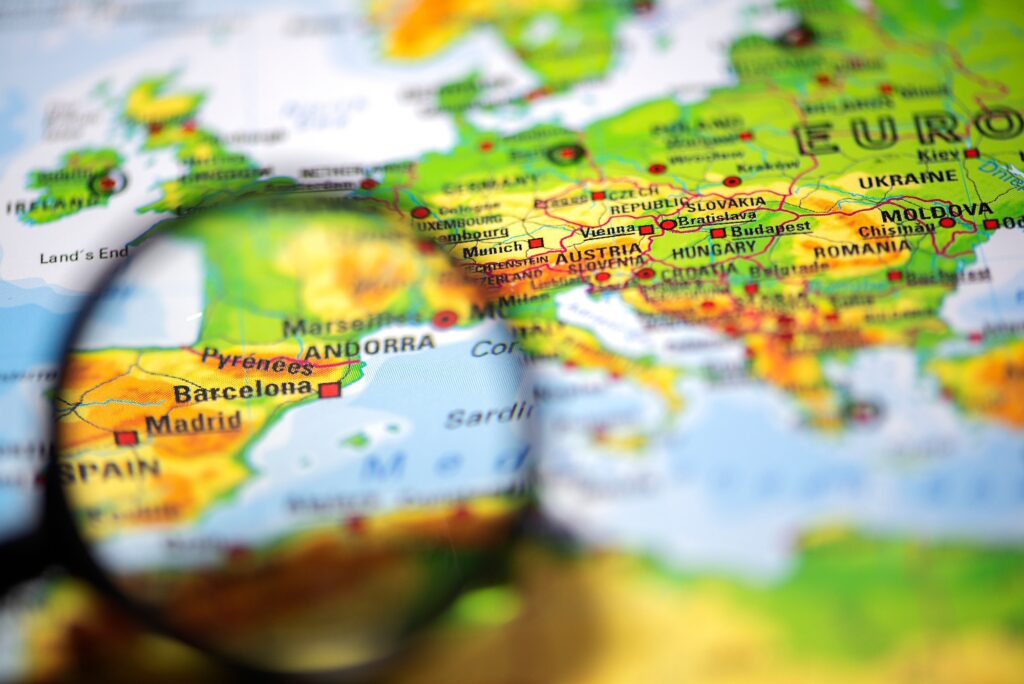 Close-up fragment of a world map with selective focus isolated on Barcelona, Spain